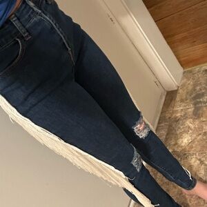 High waisted skinny jeans with tassels